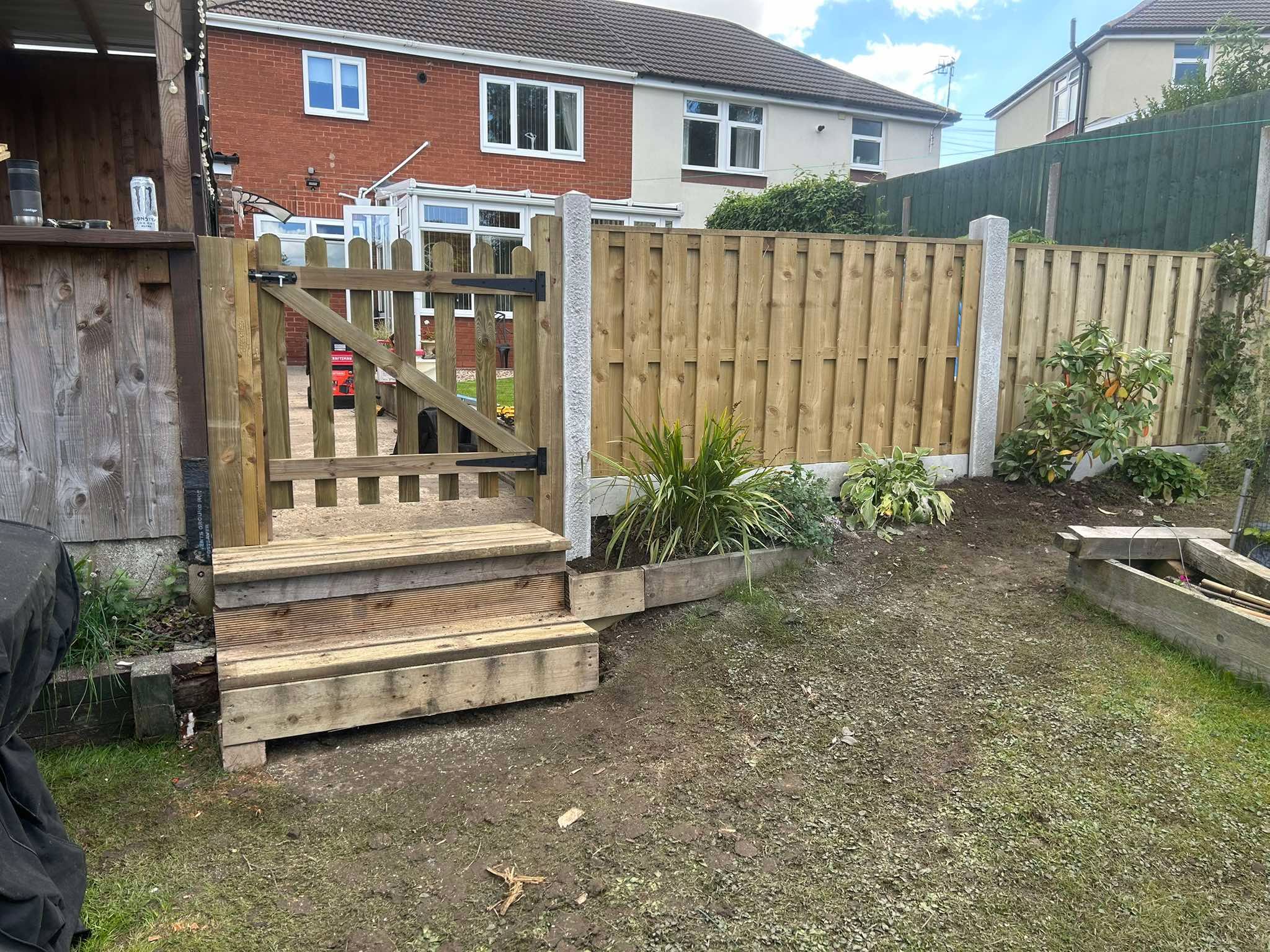 Timber garden fencing and gate installed by Top Gun & Son
